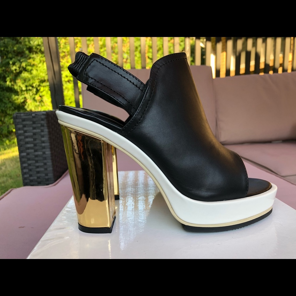 One of a kind sling back heels